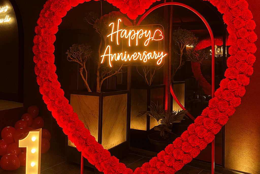 "Happy Anniversary celebration with beautiful heart shaped ring balloon decorations by Best Event Planner & Balloon Decorators, call 8595078930 for bookings."