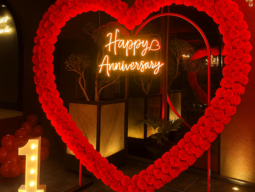 "Happy Anniversary celebration with beautiful heart shaped ring balloon decorations by Best Event Planner & Balloon Decorators, call 8595078930 for bookings."